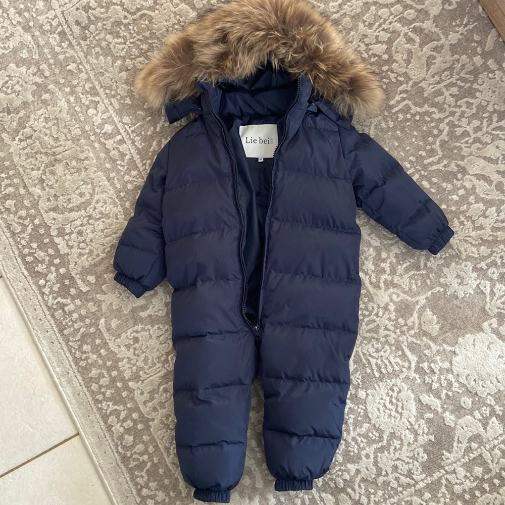 Genuine fur trim hood and down filled snowsuit